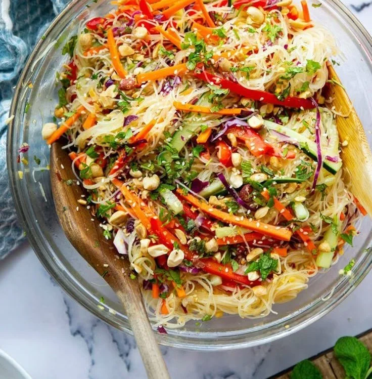 Colorful Loaded Spring Roll Salad with fresh vegetables and herbs