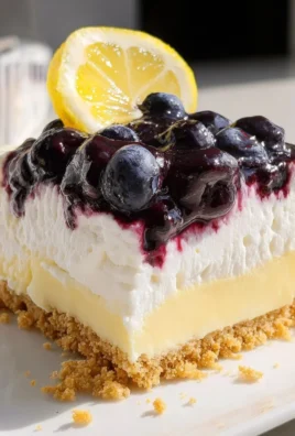 No bake lemon blueberry dessert topped with fresh blueberries