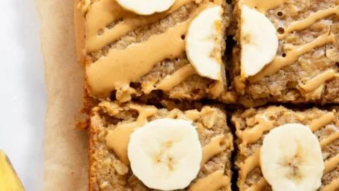 Peanut Butter Banana Baked Oatmeal served in a bowl with fresh banana slices