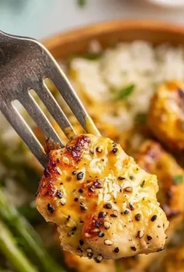 Delicious honey mustard chicken bowl with fresh vegetables and grains