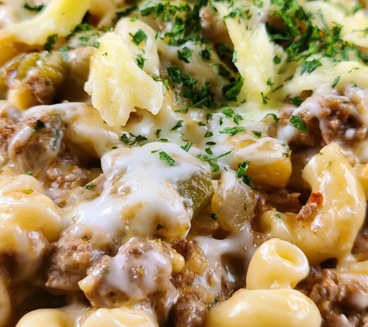 Delicious Philly Cheesesteak Pasta dish garnished with herbs