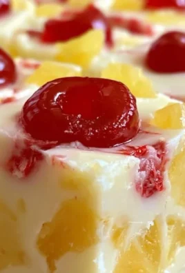Delicious Pineapple Upside Down Fudge dessert with pineapple topping.