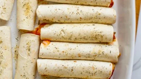 Homemade Pizza Roll Ups with cheese and pepperoni on a plate