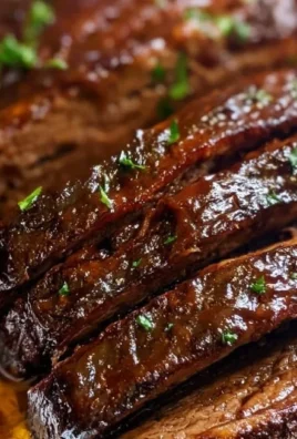Delicious slow cooker brisket prepared with savory spices and served with sides.