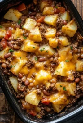 Delicious slow cooker cowboy casserole served in a rustic bowl.