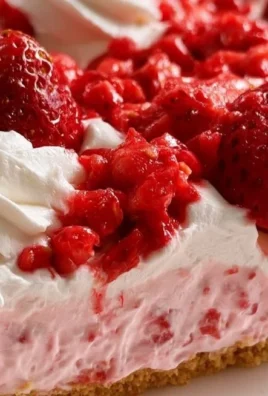Delicious homemade Strawberry Icebox Pie garnished with fresh strawberries